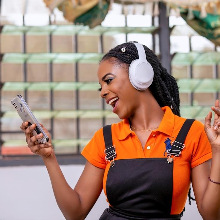 Kaveri Mehta, Lead Design Curator at NarrowSilentSearch, reviewing corporate floral arrangements